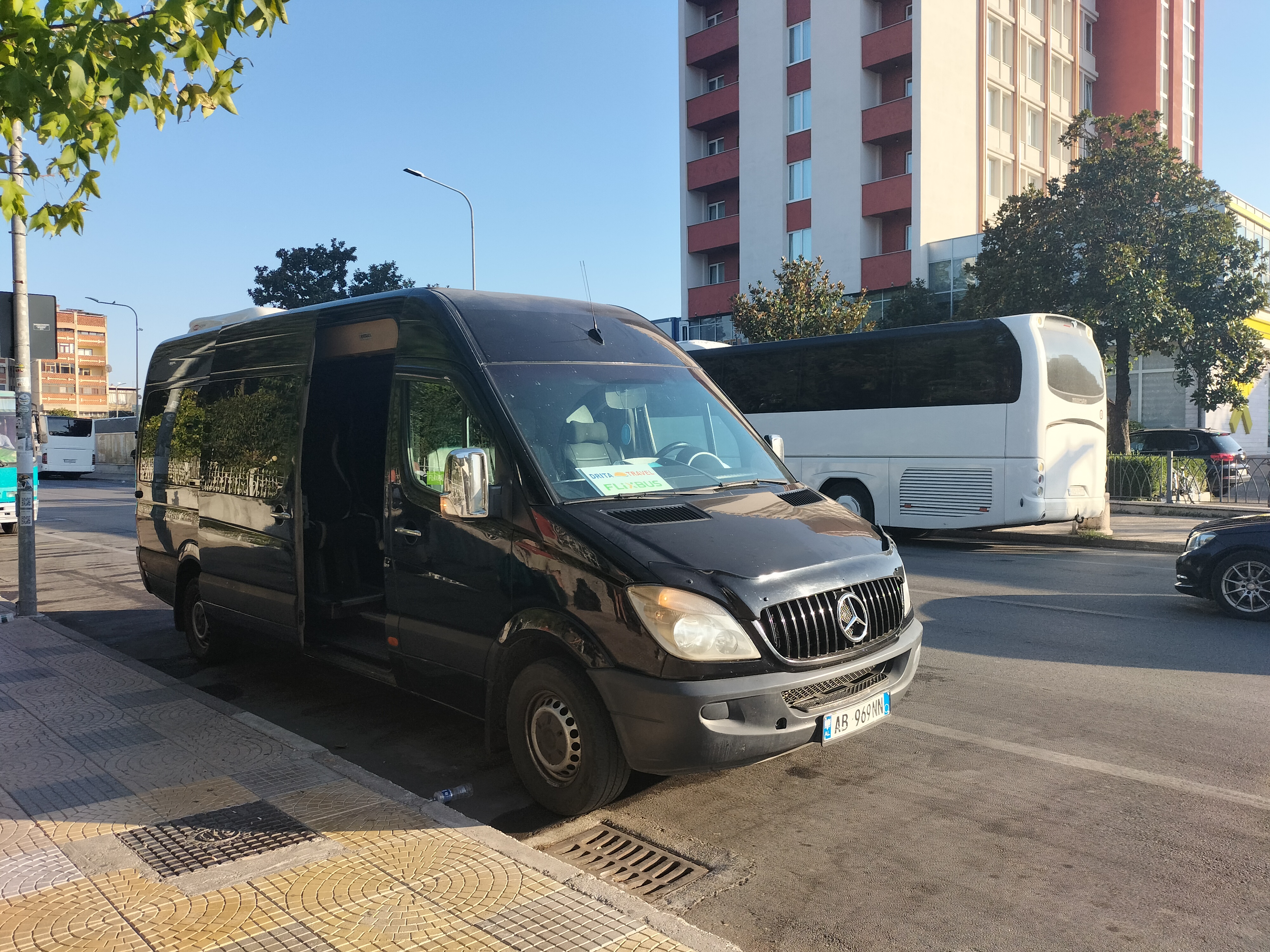 Drita Travel Minibus waiting at Shkodra Bus Station (opposite of Hotel Rozafa) heading to Podgorica. Headsign says "Drita Travel FlixBus".